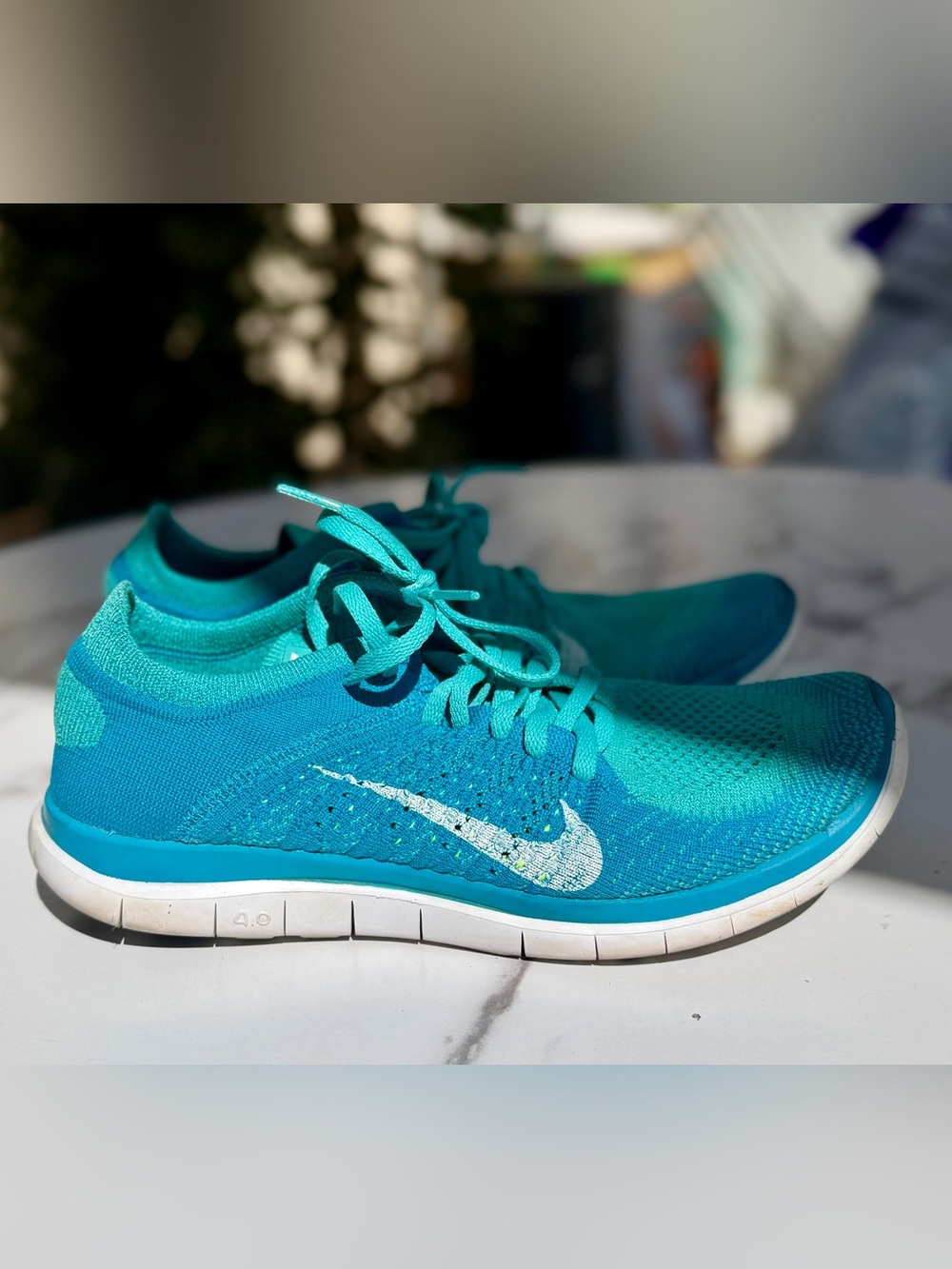 SOLD Nike Free 4.0 Flyknit in turquoise color way